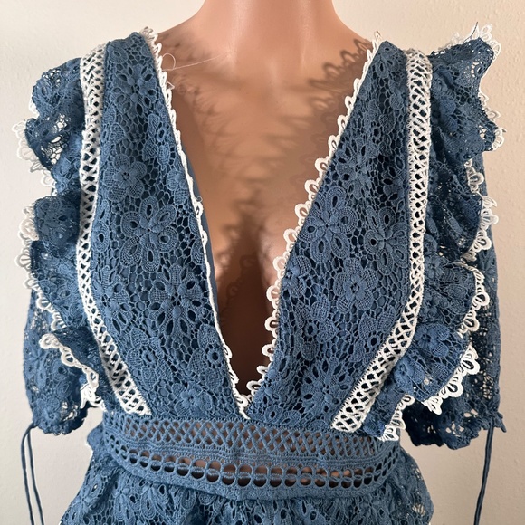 ASOS DESIGN Lace mini dress with ruffle sleeves and contrast trim in blue in M. - Picture 7 of 8